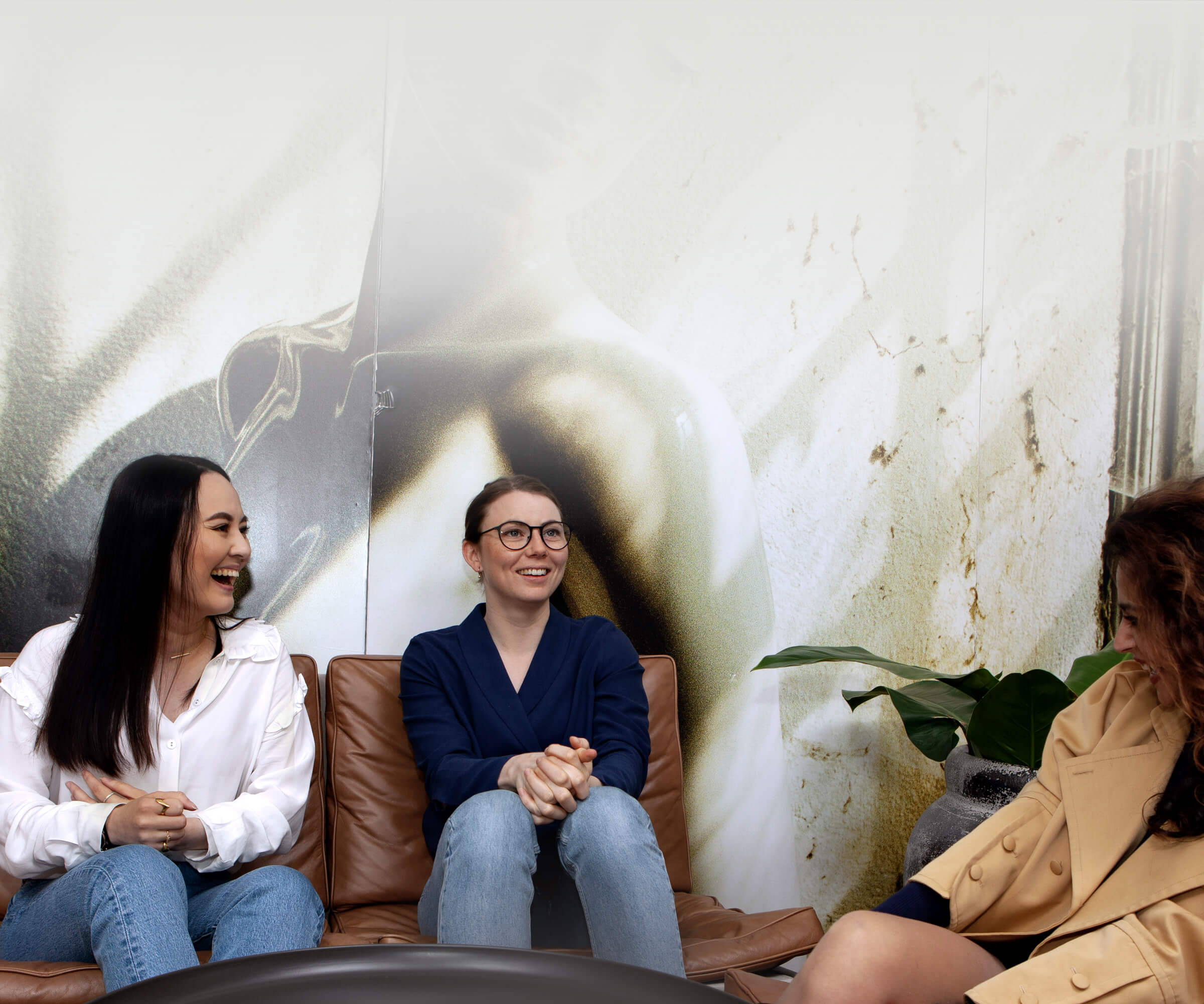 3 woman having a informal meeting